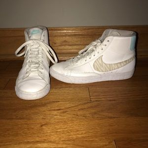 White Nike High Top Sneakers
Size 7.5
